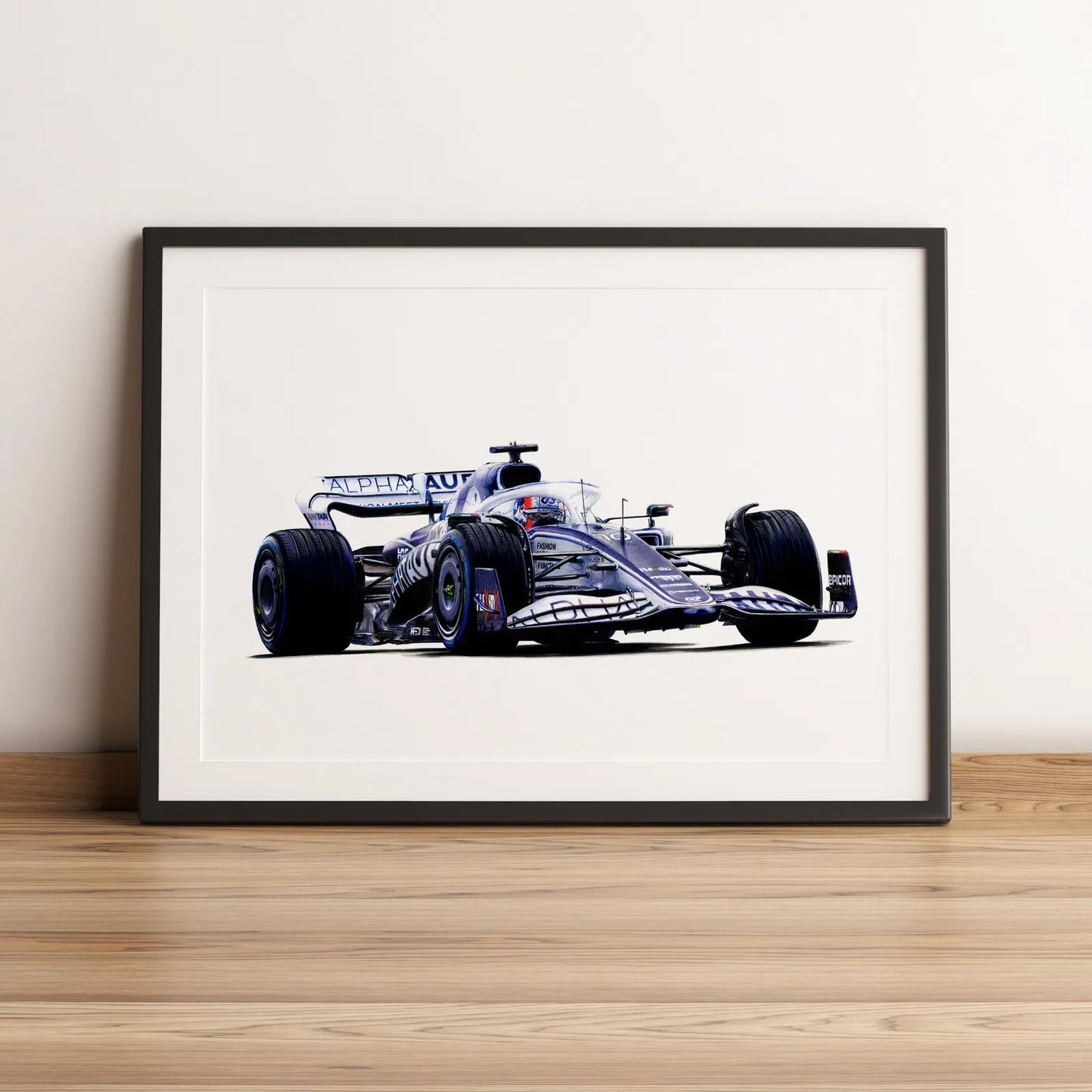 Illustration Formule 1 de Pierre Gasly au volant de l'AlphaTauri AT03 2022 dessinée à la main par l’artiste Anthony Caillon.